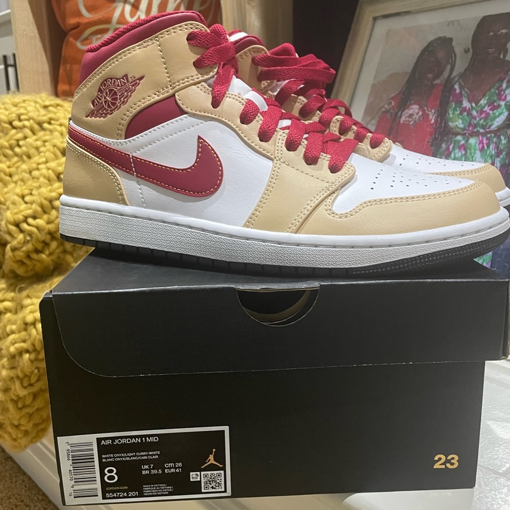 Jordan 1, Color is tan and Red. Never worn, just tried on.